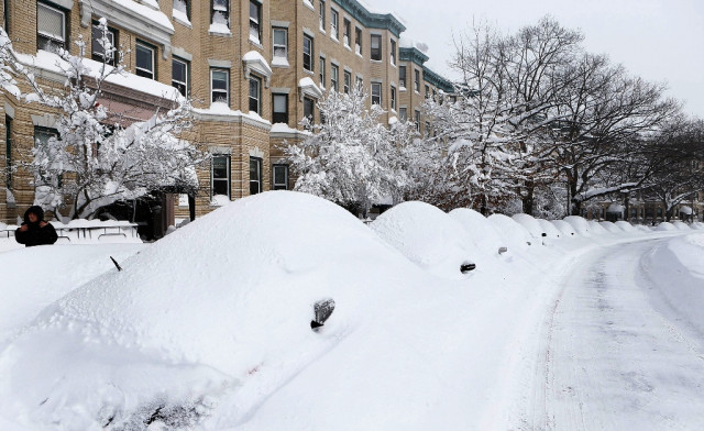 snow covered vehicles sit on commonwealth avenue on february 9 2013 in the brighton neighborhood of boston massachusetts photo afp snow covered vehicles sit on commonwealth avenue on february 9 2013 in the brighton neighborhood of boston massachusetts photo afp