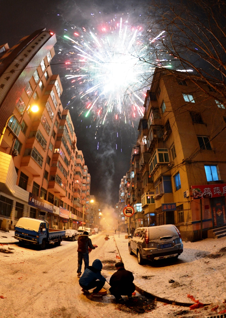 revellers across the city lit fireworks and prayed as china traditionally welcomed in the new year photo afp