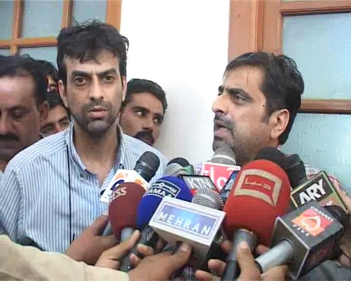 file photo of factory owners arshad bhaila and shahid bhaila speaking to the media photo express file