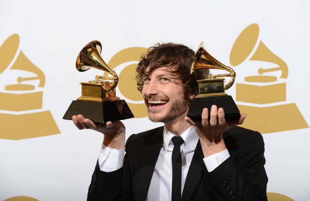 gotye poses with his trophies in the press room at the staples center during the 55th grammy awards in los angeles california february 10 2013 photo afp