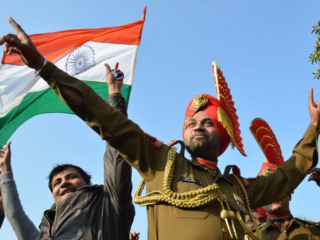 indian border security force personnel dance as they celebrate republic day at the india pakistan wagah border post photo afp