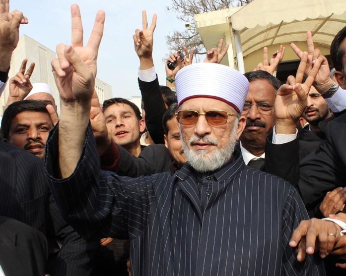 tahirul qadri makes a victory sign while arriving at the supreme court on monday photo sana file