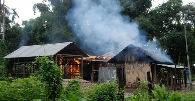 a house burns at kachugaon village in kokrajhar district in northeastern state of assam during violent clashes on july 23 2012 photo afp a house burns at kachugaon village in kokrajhar district in northeastern state of assam during violent clashes on july 23 2012 photo afp