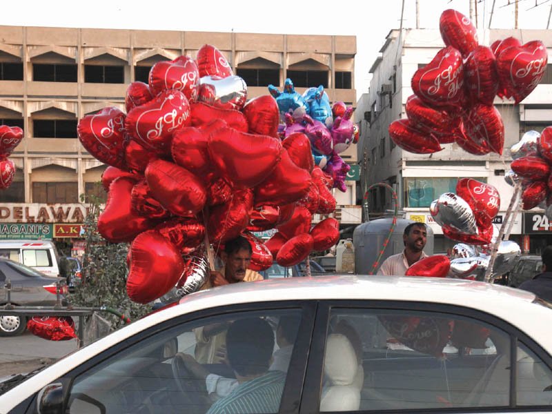 vendors sell balloons for valentine 039 s day photo athar khan express