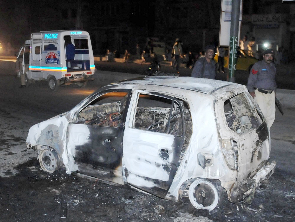 as many as two private vehicles were torched photo mohammad adeel express file