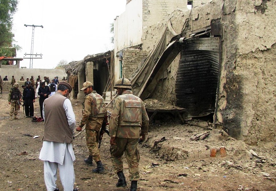 a photo showing security forces near the police station attacked by suicide bombers photo online