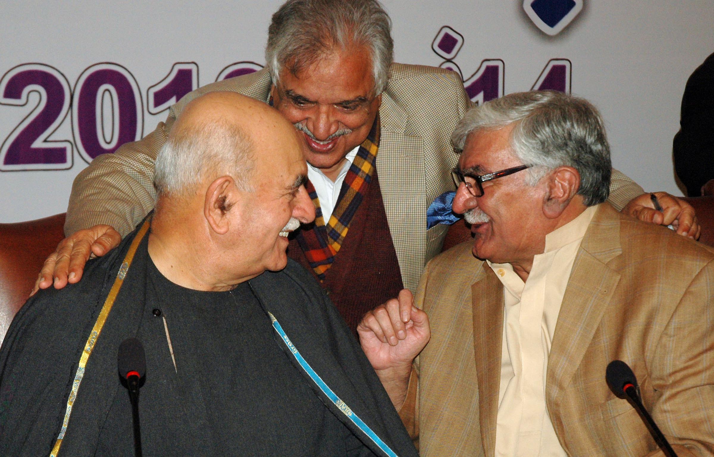 light chat between president anp asfandyar wali chairman pakhtoonkhwa milli awami party mehmood khan achakzai and secretary general pml n iqbal zafar jhagra at all parties conference in islamabad on thursday photo express tribune