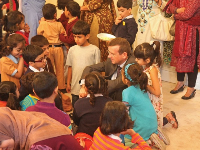 british deputy high commissioner francis campell with students from over 50 schools at acton house on thursday for an interactive story telling session designed to encourage them to read more photo courtesy press release british deputy high commissioner francis campell with students from over 50 schools at acton house on thursday for an interactive story telling session designed to encourage them to read more photo courtesy press release
