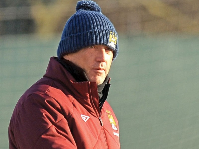 mancini believes the race for the league title is not over yet photo afp mancini believes the race for the league title is not over yet photo afp