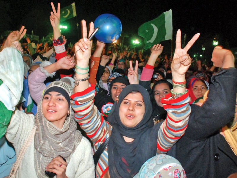 women participants cheer tahirul qadri s speech at the gujranwala jalsa photo afp