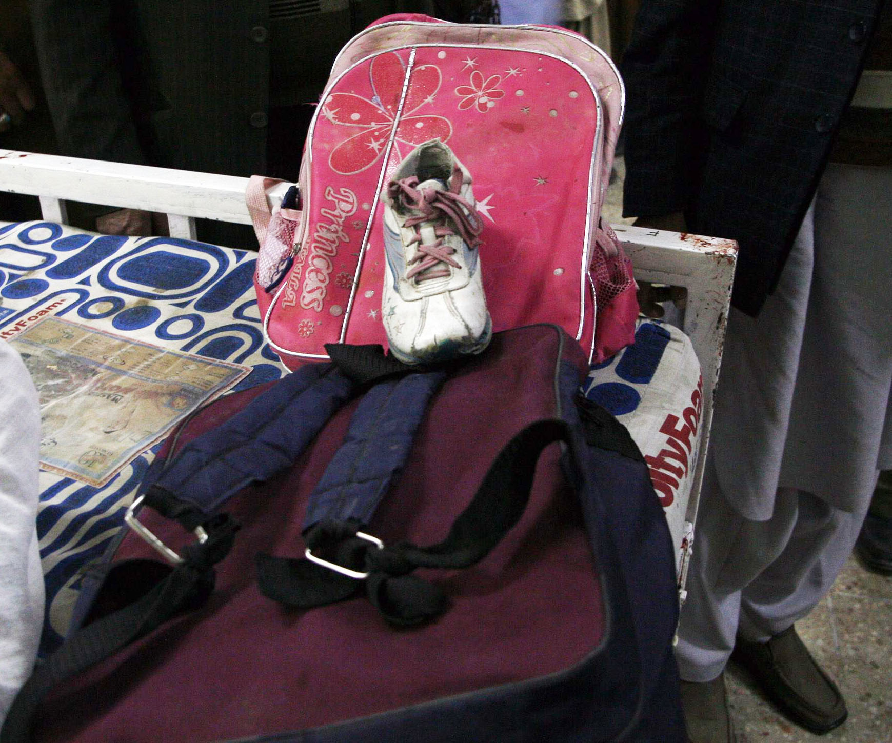 schoolbags and a shoe of children killed in the kirani road bomb blast are seen at a hospital in quetta photo reuters