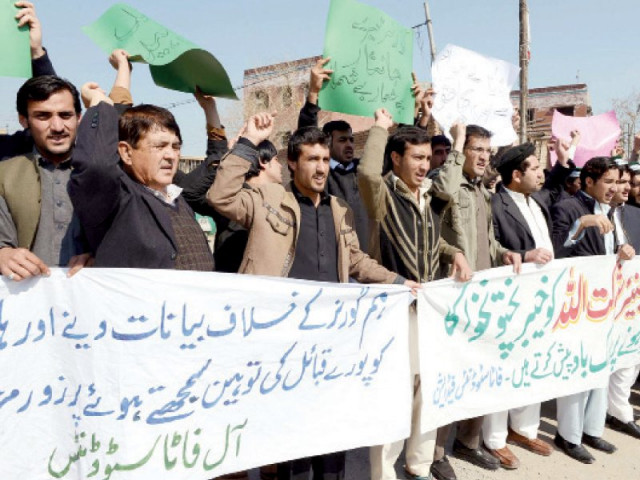members of the fata students federation chant slogans in favour of khyber pakhtunkhwa governor shaukatullah khan at the peshawar press club on saturday photo ppi members of the fata students federation chant slogans in favour of khyber pakhtunkhwa governor shaukatullah khan at the peshawar press club on saturday photo ppi