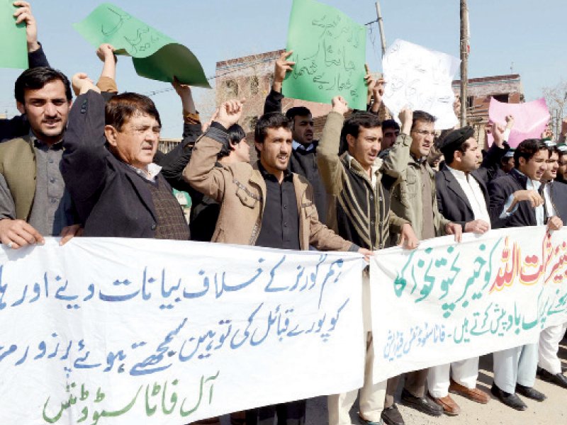 members of the fata students federation chant slogans in favour of khyber pakhtunkhwa governor shaukatullah khan at the peshawar press club on saturday photo ppi