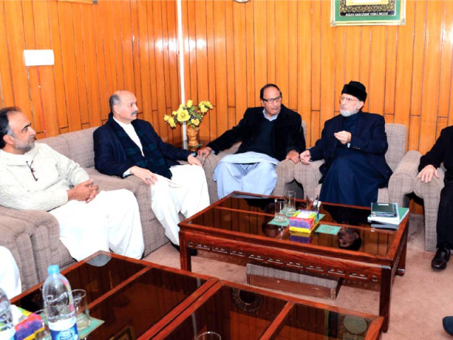 a delegation of the government meets tahirul qadri at his residence photo inp a delegation of the government meets tahirul qadri at his residence photo inp