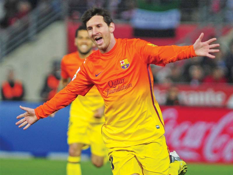 messi s heroics once again saved barcelona as they beat granada 2 1 photo afp