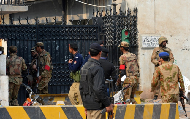 pakistani army soldiers move at the office of the top political official of khyber tribal region after the militants attack in peshawar photo afp pakistani army soldiers move at the office of the top political official of khyber tribal region after the militants attack in peshawar photo afp