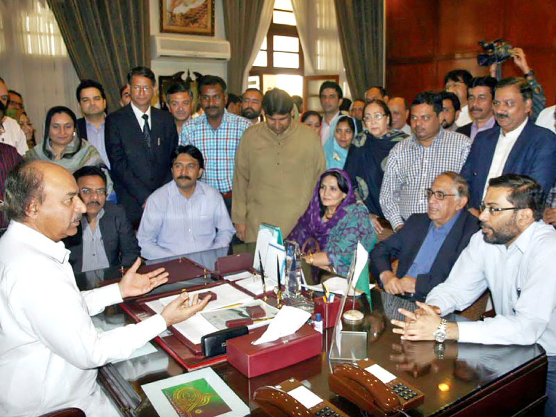 mqm members of sindh provincial assembly talk to speaker nisar khoro after submitting their application for allotment of opposition benches for the party photo online