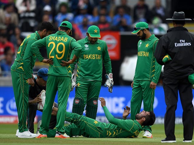 mohammad amir hurt his left leg and left the field india v pakistan champions trophy group b birmingham june 4 2017 photo getty