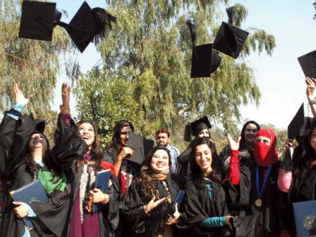 students toss their graduation caps in joy at the convocation photo inp