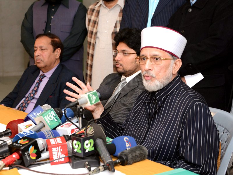 dr tahirul qadri speaking at a press conference photo nni