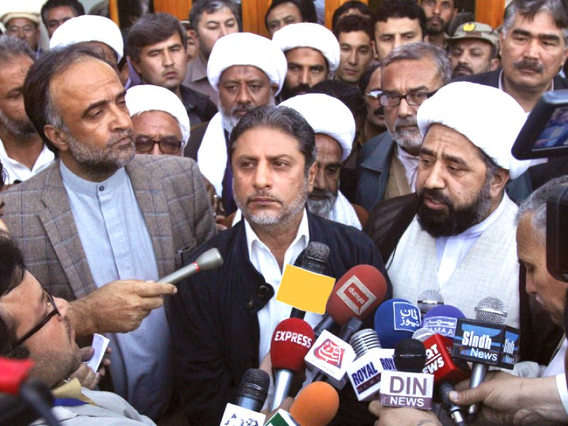 information minister qamar zaman balochistan governor zulfiqar magsi and shia leaders talk to the media after a meeting during a protest rally in quetta photo afp