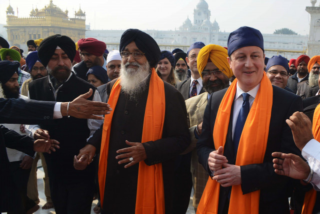 british prime minister david cameron r along with punjab chief minister parkash singh badal c visit the sikh shrine golden temple in amritsar india photo afp narinder nanu british prime minister david cameron r along with punjab chief minister parkash singh badal c visit the sikh shrine golden temple in amritsar india photo afp narinder nanu