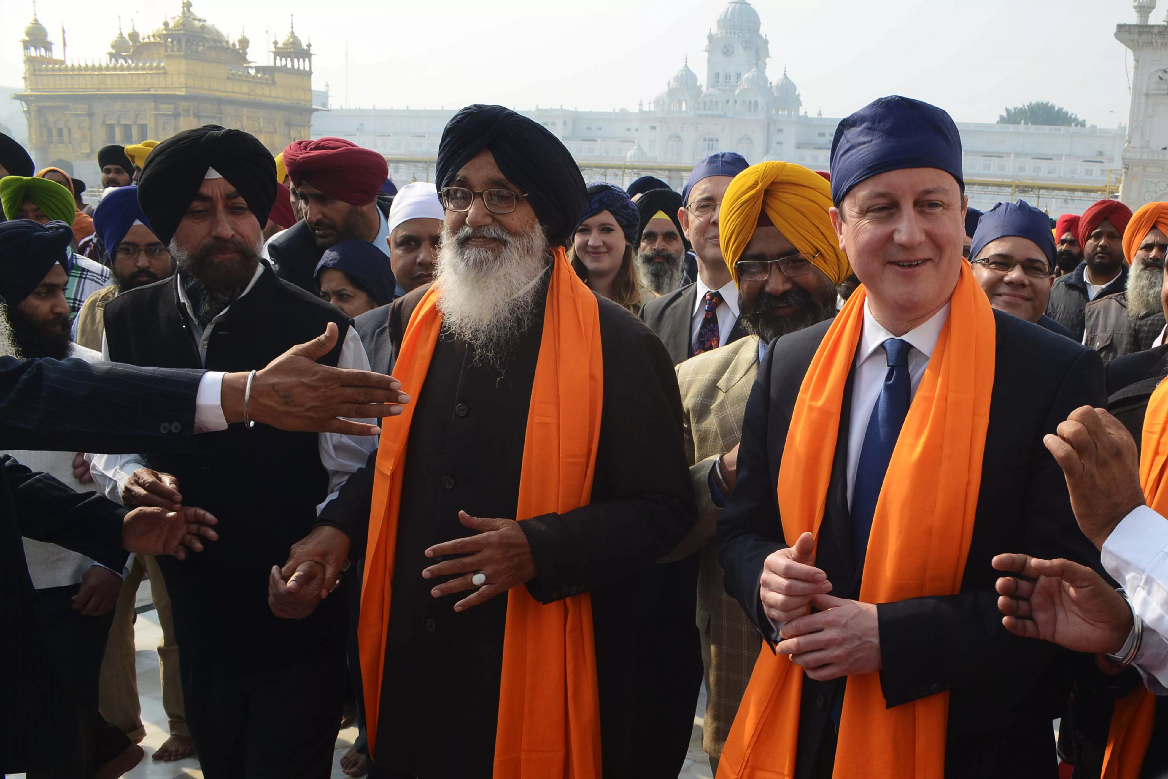 british prime minister david cameron r along with punjab chief minister parkash singh badal c visit the sikh shrine golden temple in amritsar india photo afp narinder nanu british prime minister david cameron r along with punjab chief minister parkash singh badal c visit the sikh shrine golden temple in amritsar india photo afp narinder nanu