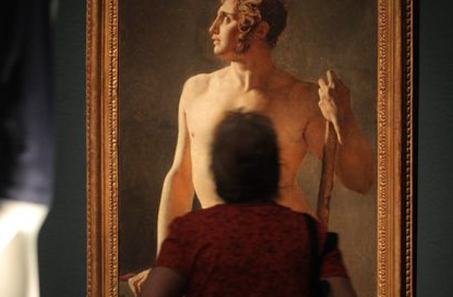 a visitor looks at the painting quot male torso quot by french painter jean auguste dominique ingres during an art exhibition 039 nude men 039 at the leopold museum photo reuters