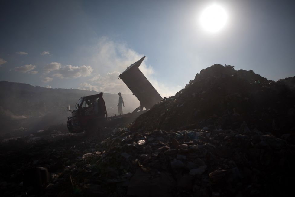 the smoke from the waste is causing respiratory problems among residents says a factory worker photo afp