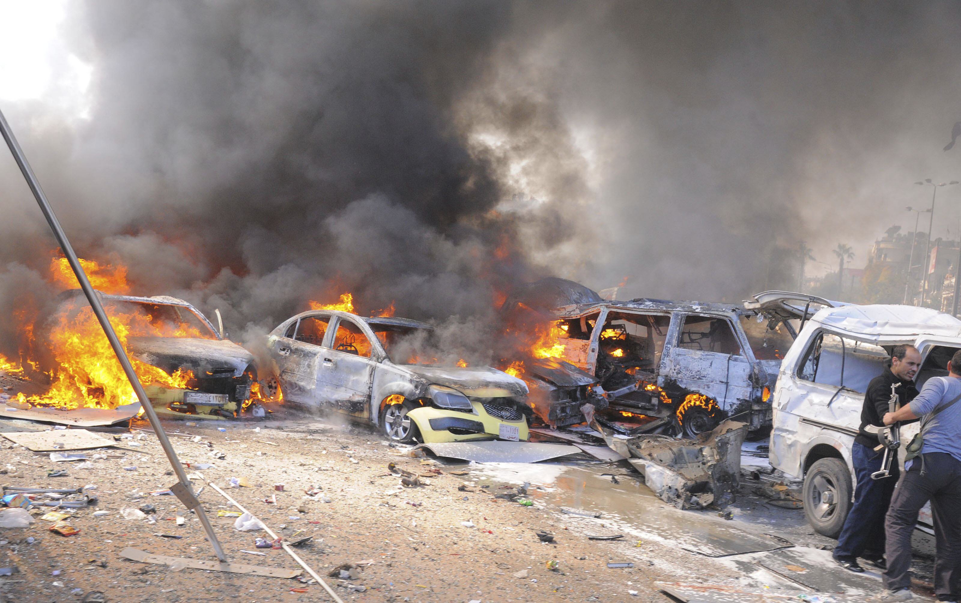 vehicles burn after an explosion at central damascus february 21 2013 photo reuters sana