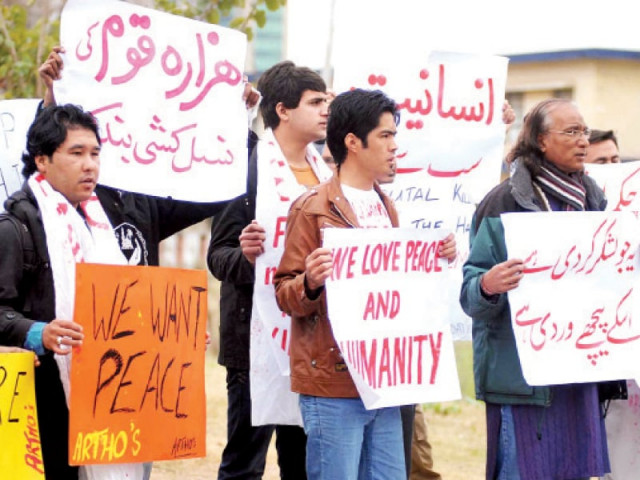 activists holding placards during a protest over hazara killings in islamabad on thursday photo online activists holding placards during a protest over hazara killings in islamabad on thursday photo online