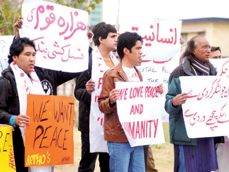 activists holding placards during a protest over hazara killings in islamabad on thursday photo online