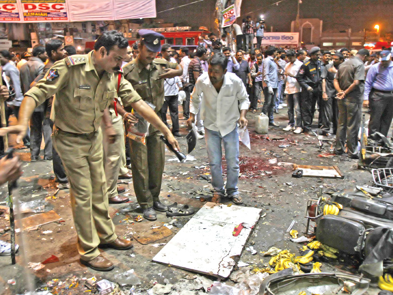 police inspect site following a series of bomb blasts at the main railway station in hyderabad photo reuters