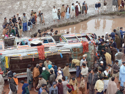 bus plunges into canal at least 13 dead