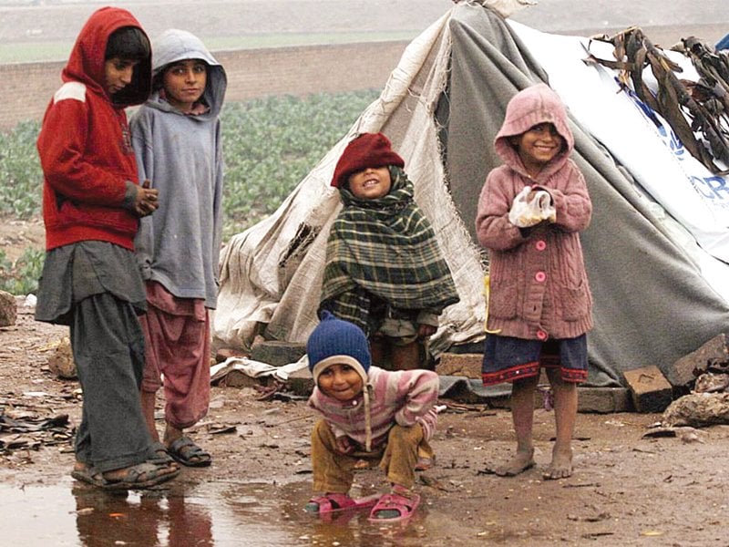 small joys children play during the fresh spell of rainfall in the city photo app