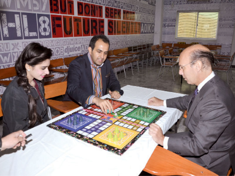 spanish ambassador carbajosa playing a game of ludo against rms ceo faisal mushtaq photo muhammad javaid express