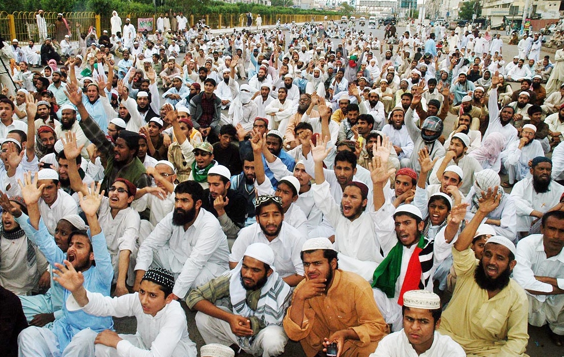 aswj workers and supporters hold a sit in in karachi on friday photo online