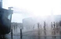 people enjoy water sprayed by a police water cannon in front of the olympic stadium during the ongoing heatwave in berlin photo reuters