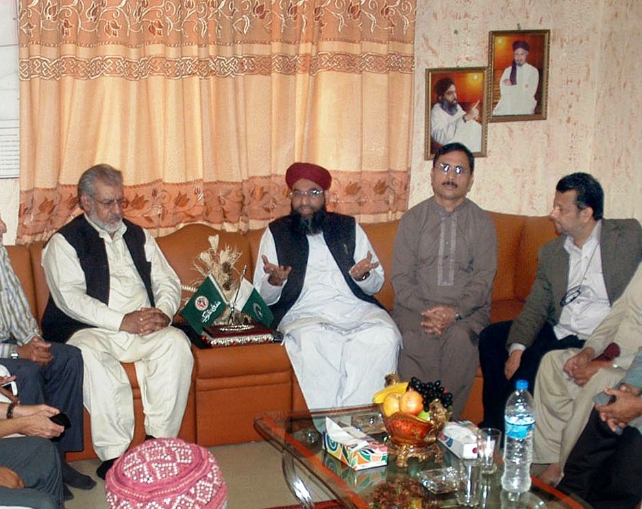 a photo showing sunni tehreek leader during meeting with karachi traders photo express