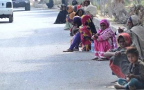 a large number of beggars sitting on the roadside waiting for mercy at wahduwah road on february 10 2022 photo app a large number of beggars sitting on the roadside waiting for mercy at wahduwah road on february 10 2022 photo app