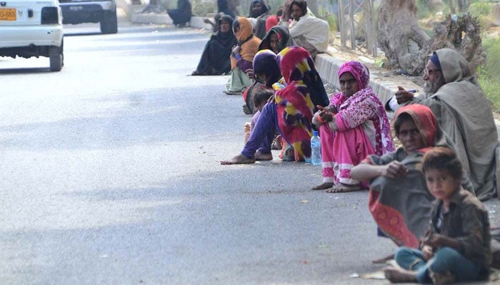 a large number of beggars sitting on the roadside waiting for mercy at wahduwah road on february 10 2022 photo app