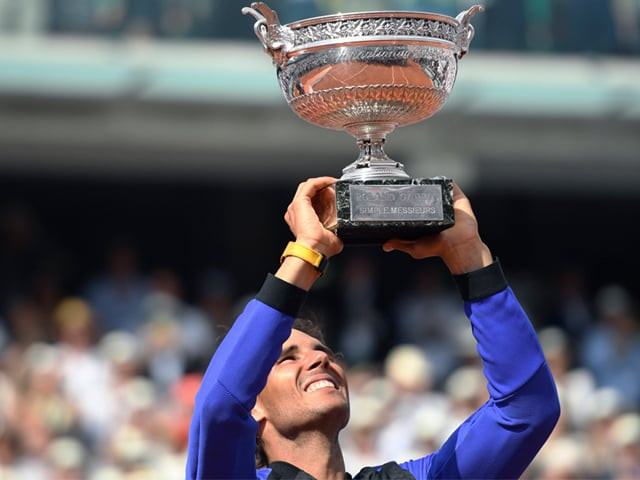 spain 039 s rafael nadal poses with his trophy after winning the men 039 s final tennis match against switzerland 039 s stanislas wawrinka at the roland garros 2017 french open on june 11 2017 in paris photo afp spain 039 s rafael nadal poses with his trophy after winning the men 039 s final tennis match against switzerland 039 s stanislas wawrinka at the roland garros 2017 french open on june 11 2017 in paris photo afp