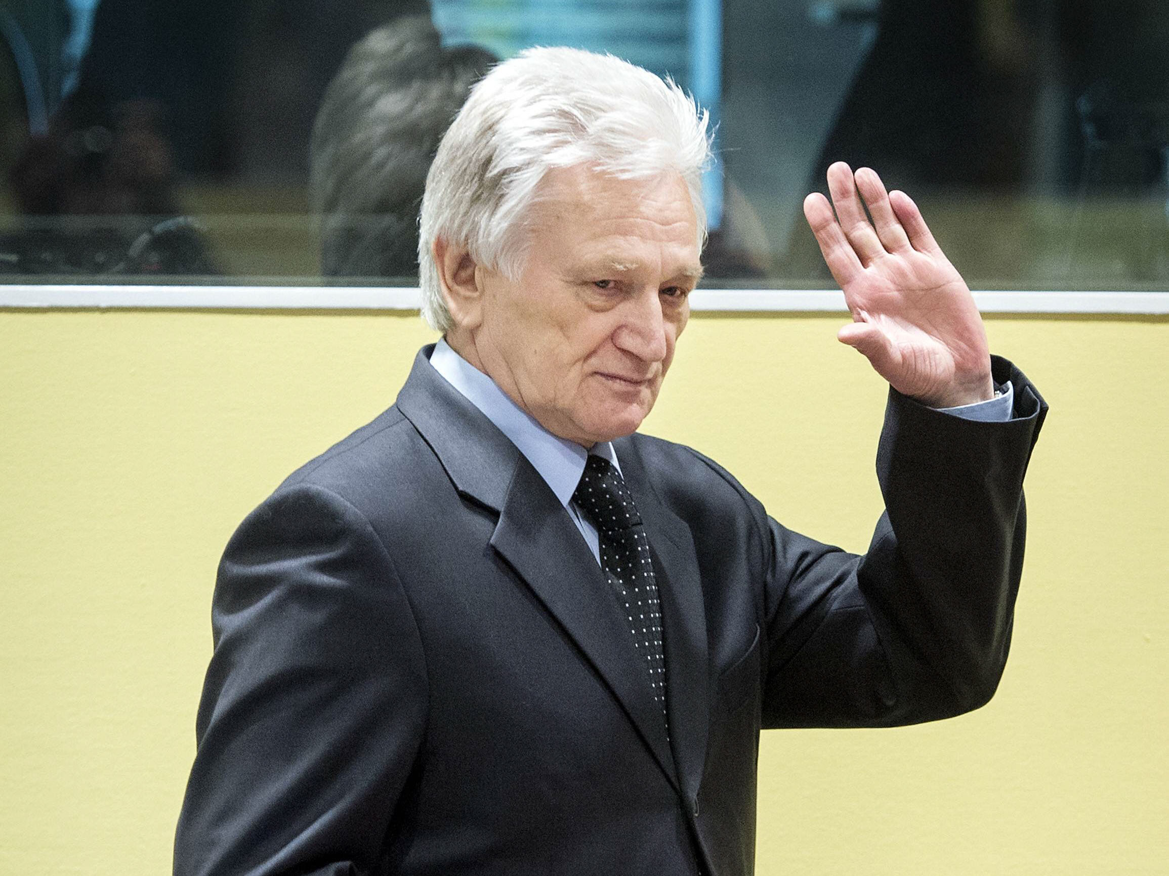 momcilo perisic the former chief of staff of the yugoslav army enters the courtroom of the yugoslav war crimes tribunal icty in the hague february 28 2013 photo reuters