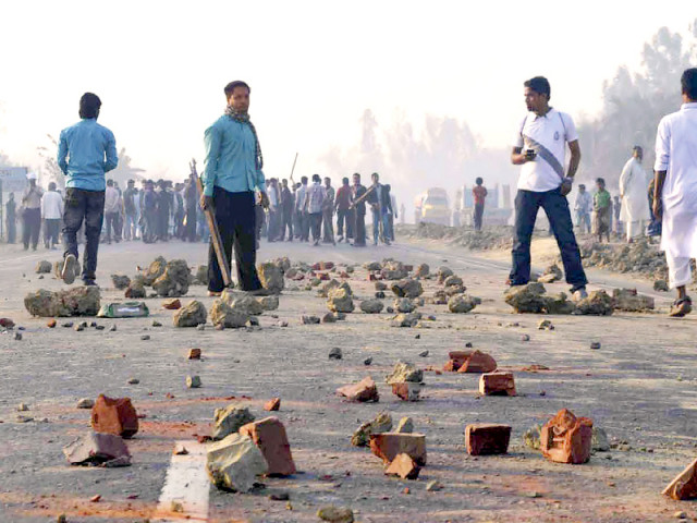 activists of jamaat e islami stand during a clash with police in chittagong after the court sentenced delwar hossain sayedee to death photo reuters activists of jamaat e islami stand during a clash with police in chittagong after the court sentenced delwar hossain sayedee to death photo reuters