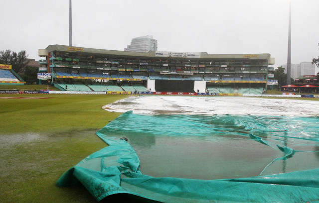 the pitch covers remain waterlogged after the match was abandoned without a ball being bowled during the 1st t20 match between south africa and pakistan on march 1 2013 photo afp the pitch covers remain waterlogged after the match was abandoned without a ball being bowled during the 1st t20 match between south africa and pakistan on march 1 2013 photo afp