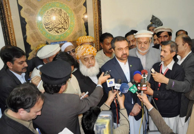 governor saukatullah and jui f chief maulana fazlur rehman talking to media after the grand jirga meeting photo express governor saukatullah and jui f chief maulana fazlur rehman talking to media after the grand jirga meeting photo express