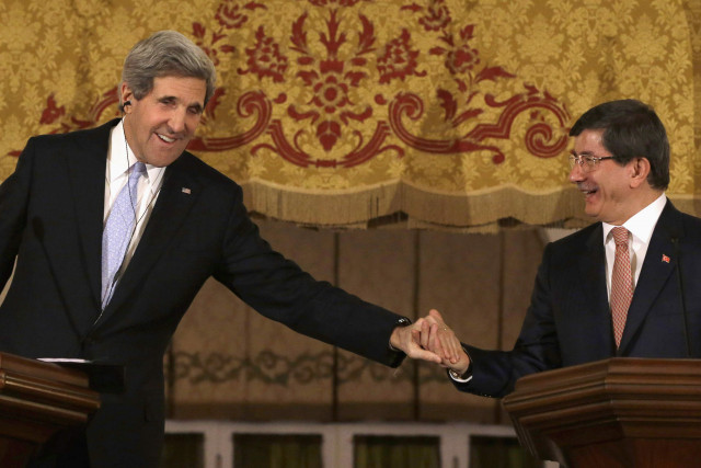 us secretary of state john kerry leans over to clasp turkish foreign minister ahmet davutoglu 039 s hand at the end of a news conference at ankara palace in ankara photo reuters us secretary of state john kerry leans over to clasp turkish foreign minister ahmet davutoglu 039 s hand at the end of a news conference at ankara palace in ankara photo reuters