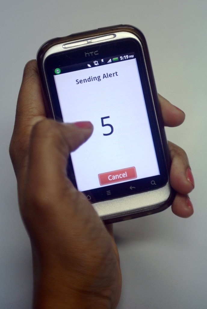 an indian pedestrian tests the free app quot stipator quot on her mobile phone in mumbai photo afp