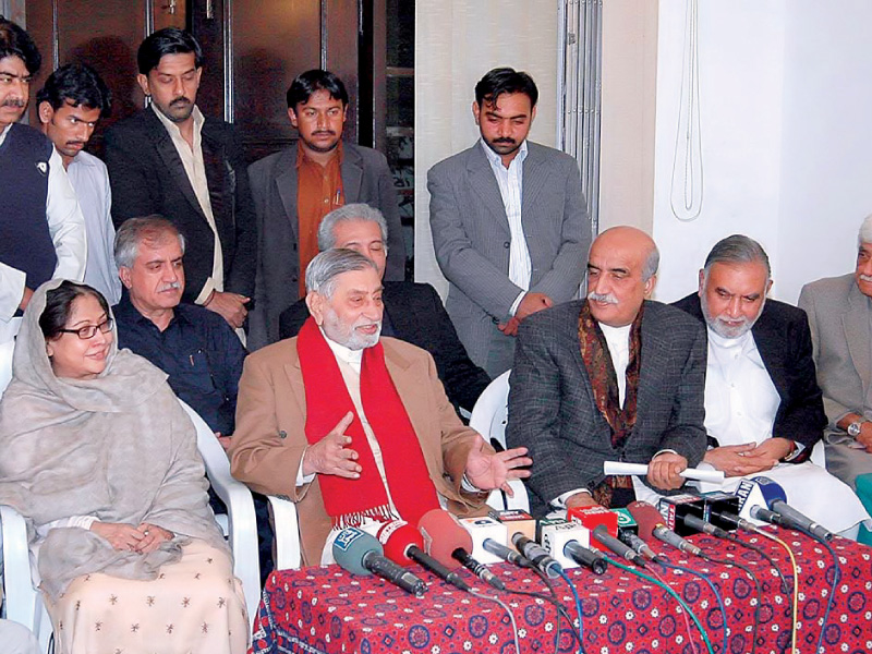 raja muhammad afzal khan with his two sons announcing their joining ppp during a news conference at the ppp media cell photo app file