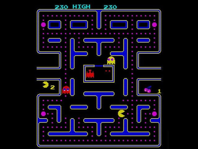 pac man 1980 and tetris 1984 get the full treatment mounted on small screens set into a dark wall pac man 1980 and tetris 1984 get the full treatment mounted on small screens set into a dark wall